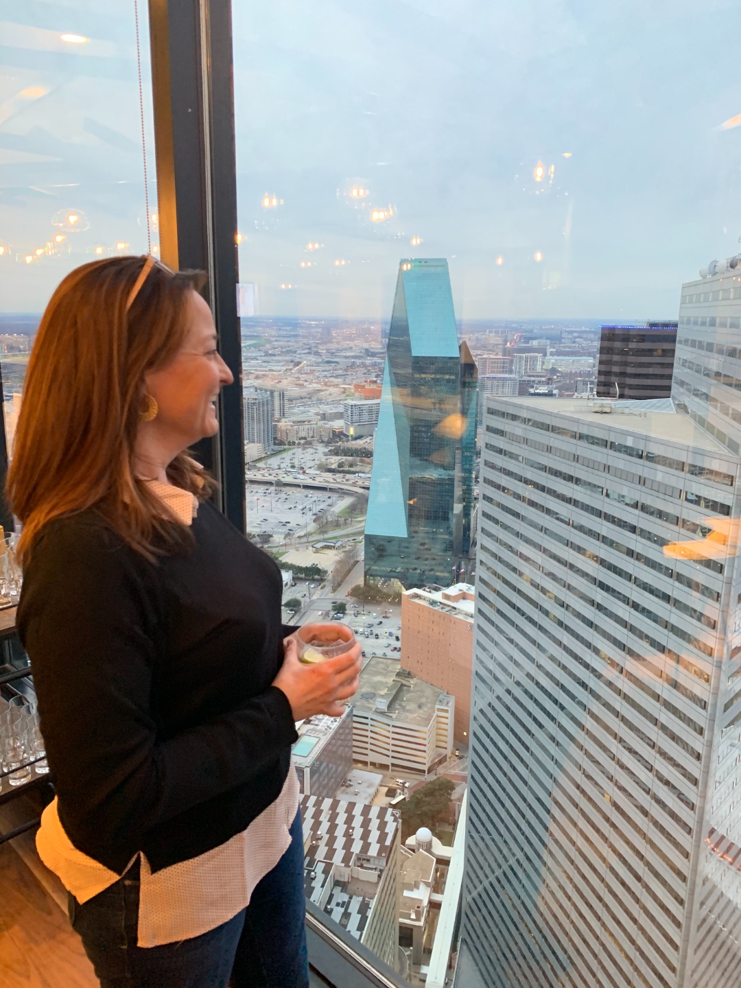 Elaina Farnsworth overlooking a city skyline